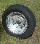 Towmaster 530 X Trailer Tire Load Range C 12" Galvanized Rim 4 Lug 12995. Fixed Price $136.00.