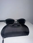 Oakley Vintage Juliet Sunglasses Metal Frame Gray Black Polarized Lenses. Fixed Price $117.00.