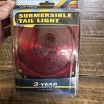 New ST4RS Optronics Trailer Passenger Side Submersible Tail Light. Fixed Price $18.80.