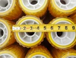 Tie Down #48662 Boat Trailer Parts Ribbed Wobble Roller 5" Yellow Non Marking. Fixed Price $23.75.